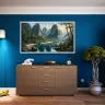 Tropical rainforest river flowing between majestic limestone formations and lush vegetation