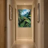 Tropical frog wall art displayed at the end of a green hallway
